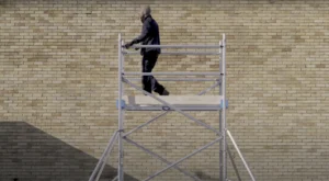 1 Certified Scaffold Tower Rather Than an Extension Ladder? 3 man working on a scaffold tower